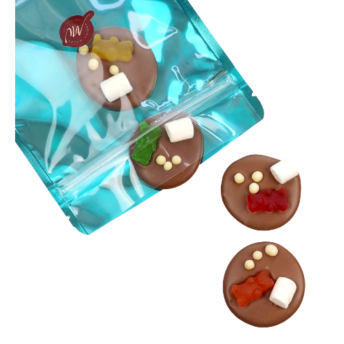 Cyan pouch with 4 milk chocolate disks topped with gummy bears, mini-marshmallows, and white chocolate balls
